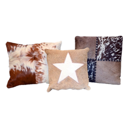 Cluster of (3) Cowhide Pillows
